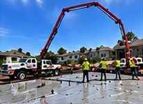 Boom pump pouring a residential slab