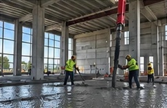 Crew placing an interior structural slab